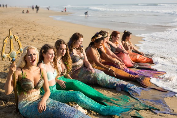 From L-R: Ashton Larson, Alisha Sweeting, Wesley Christian, Marissa Alice Martin, Sandra Rozar, Laura Anne Maturo, Julz Owen, Sara Sweica, and Chelsea Holifield on Huntington Beach, California.